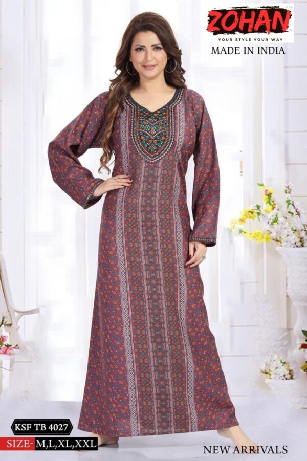 A woman models a long, maroon, patterned dress